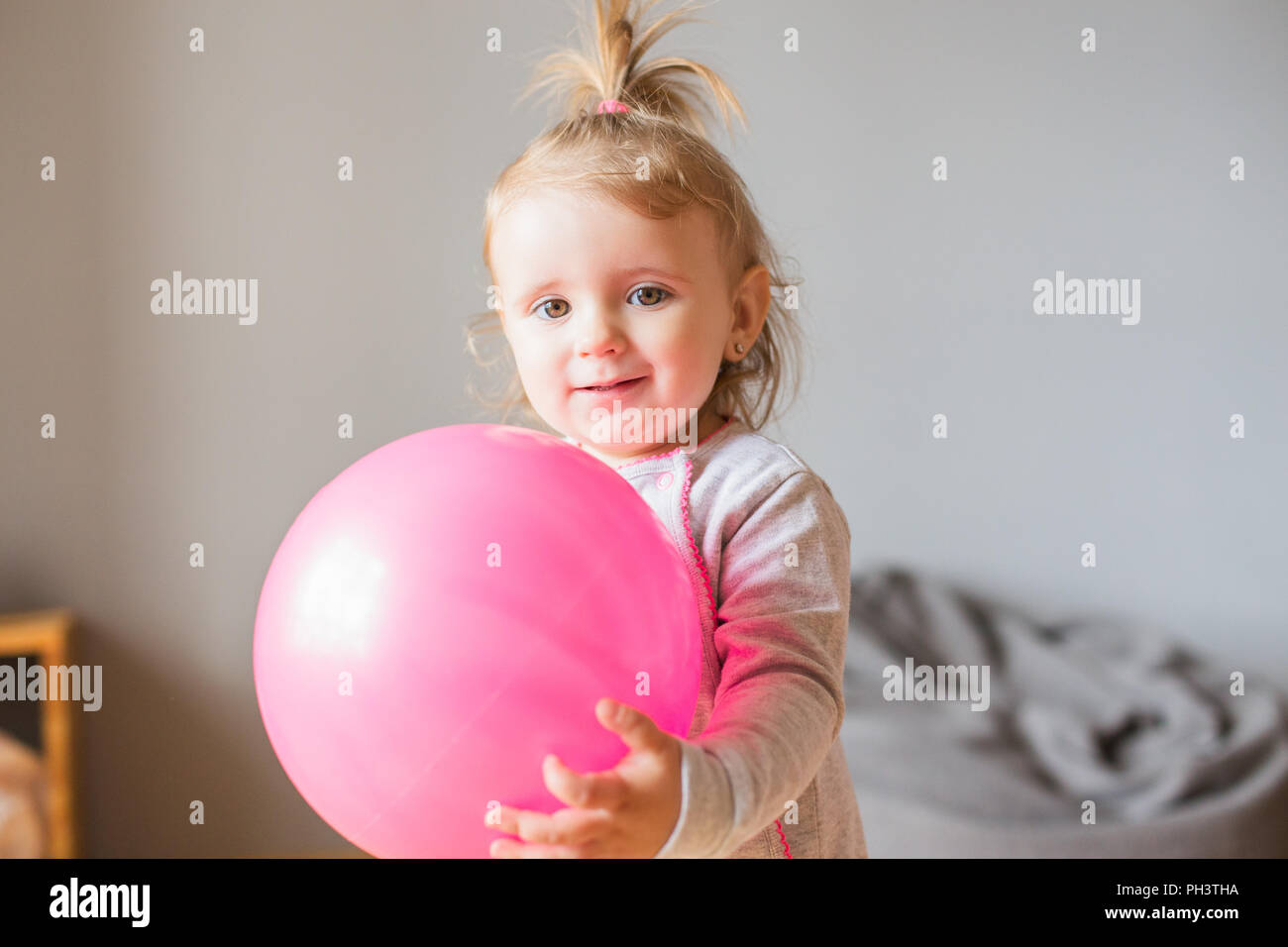 Cute little girl at real home Stock Photo - Alamy