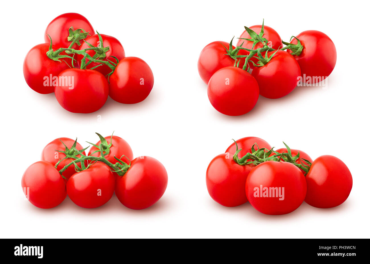 tomato on branch, isolated on white background, clipping path, full depth of field Stock Photo