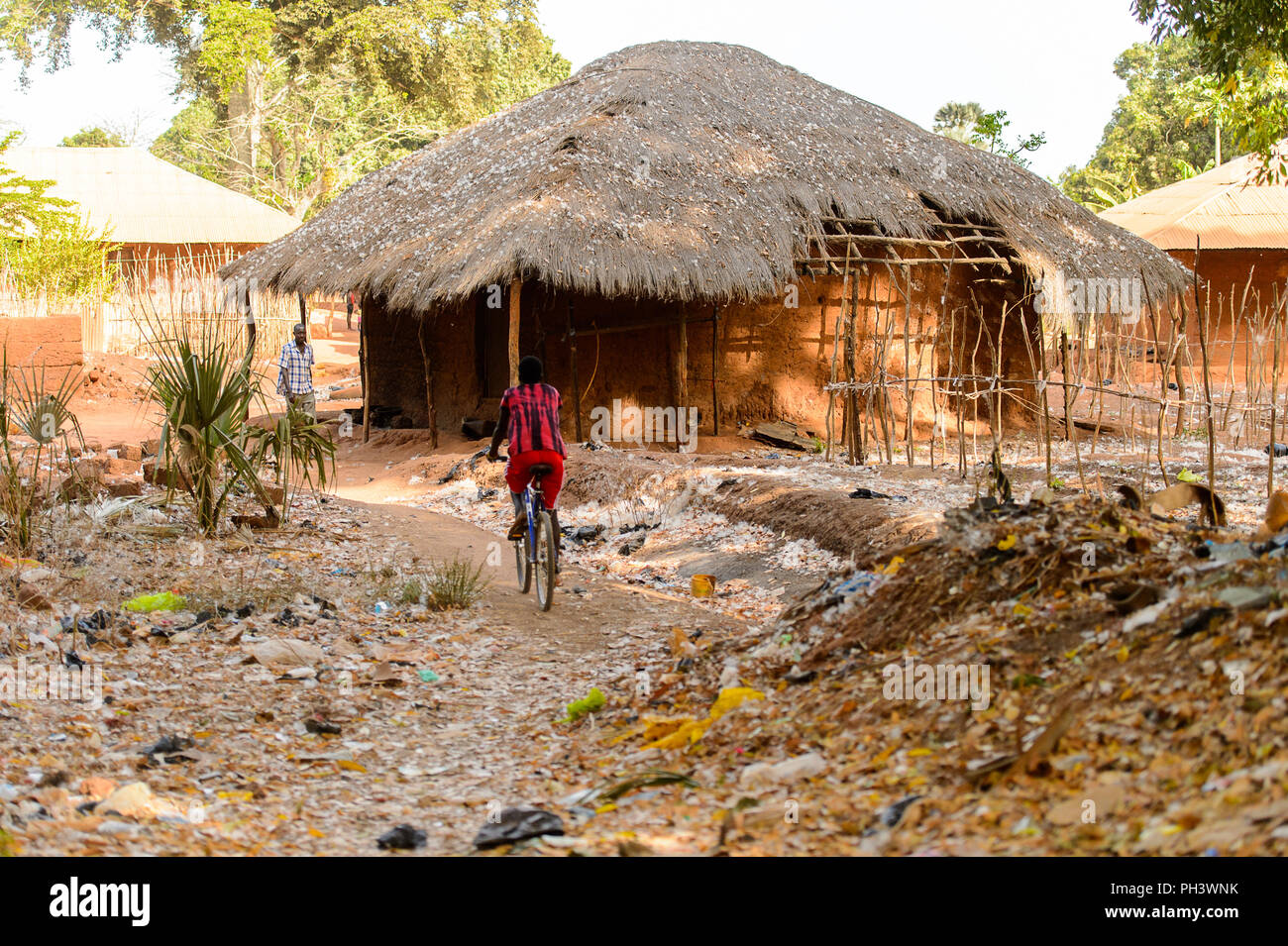 ROAD TO BISSAU, GUINEA B. - MAY 1, 2017: Unidentified Local Boy Rides A ...