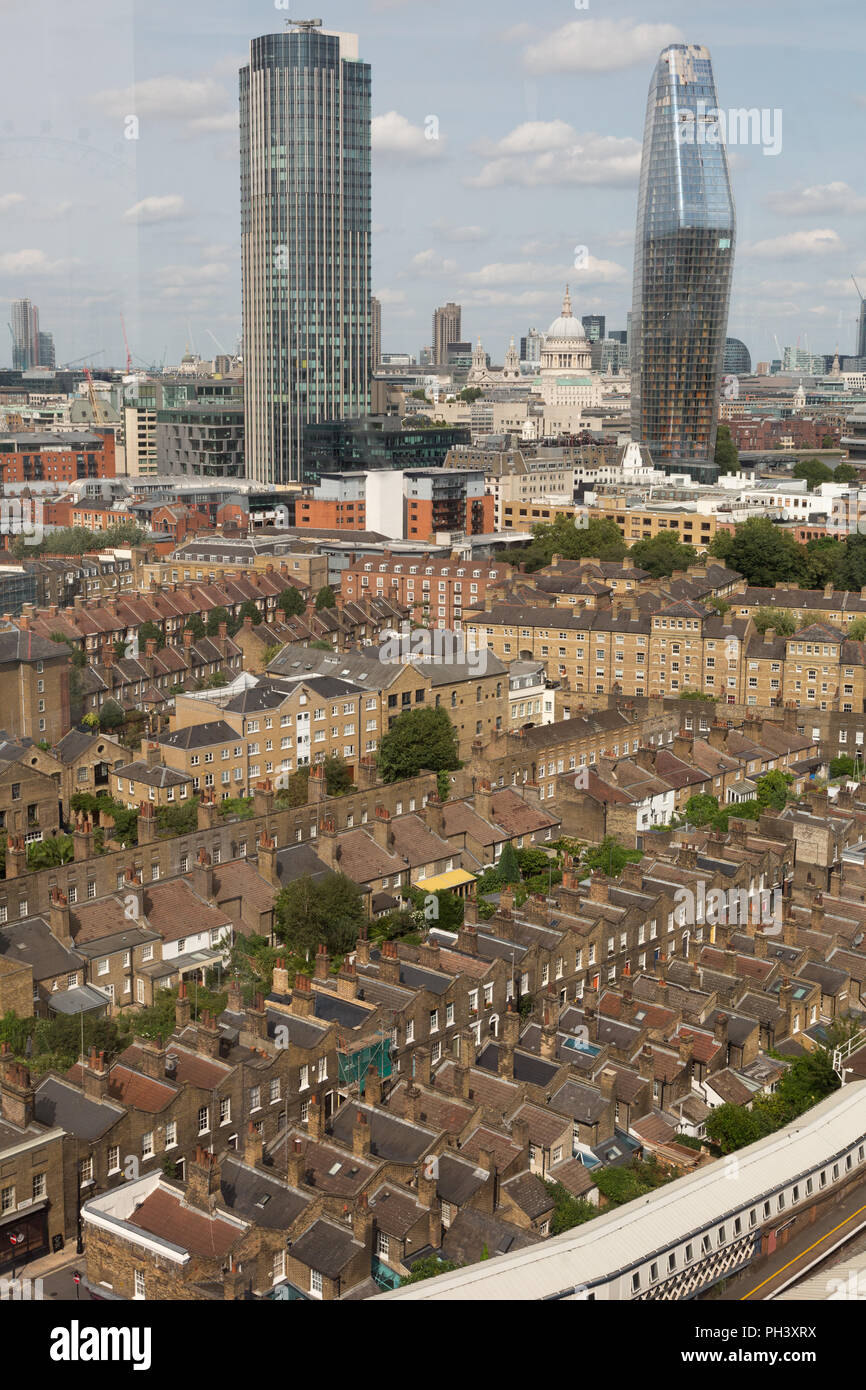 Skyscrapers and rows of densely populated housing in Waterloo, Central London. Waterloo Station can be seen in the foreground. Stock Photo