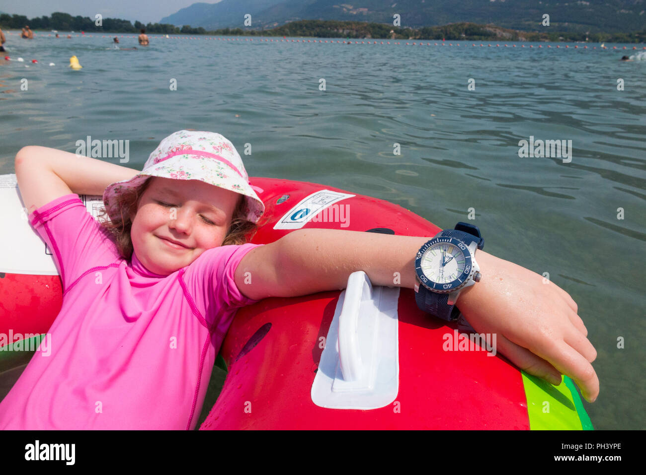 Young girl (wearing sun hat) aged 6 