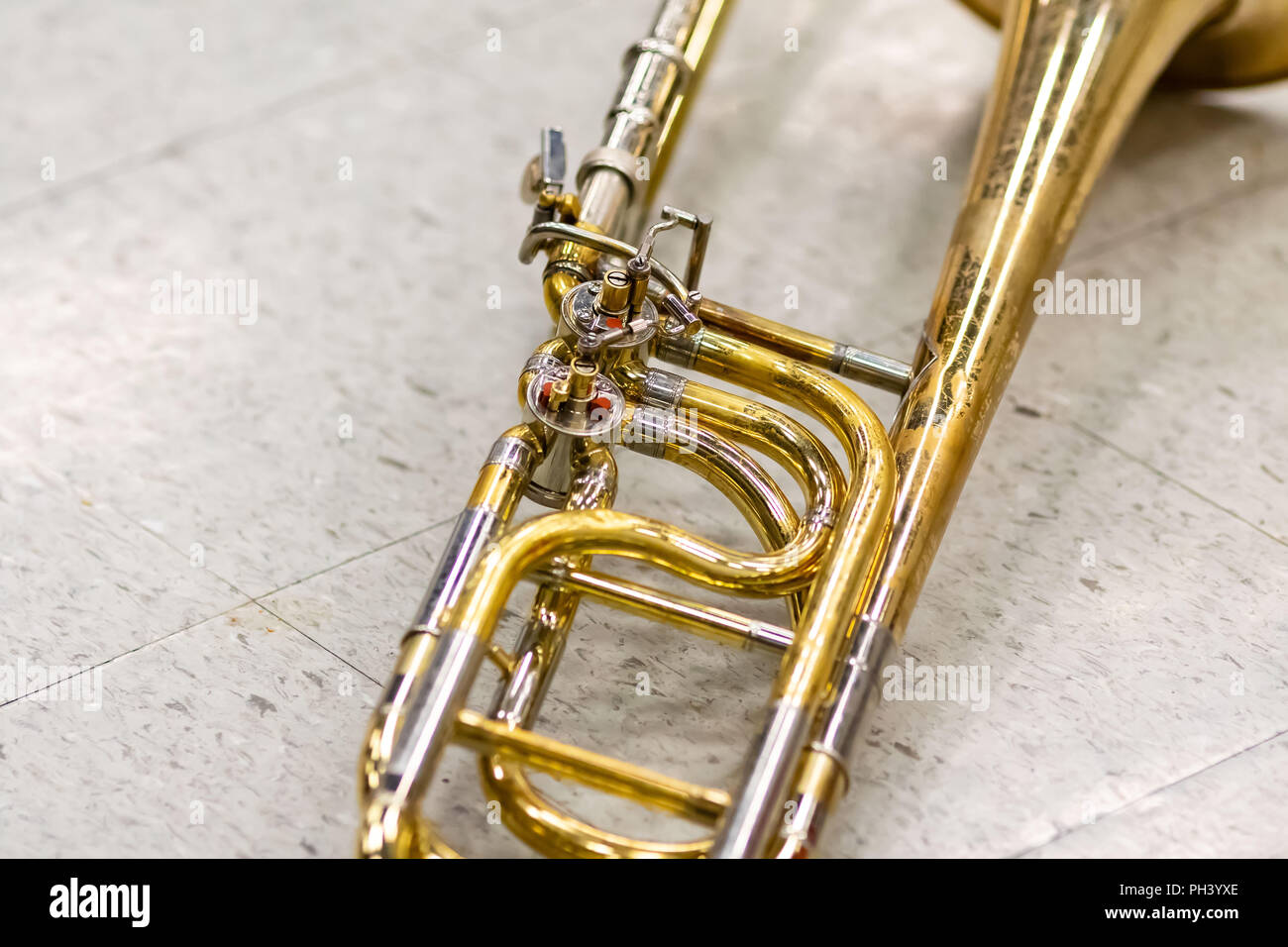 a close up of a well used marching band trombone Stock Photo