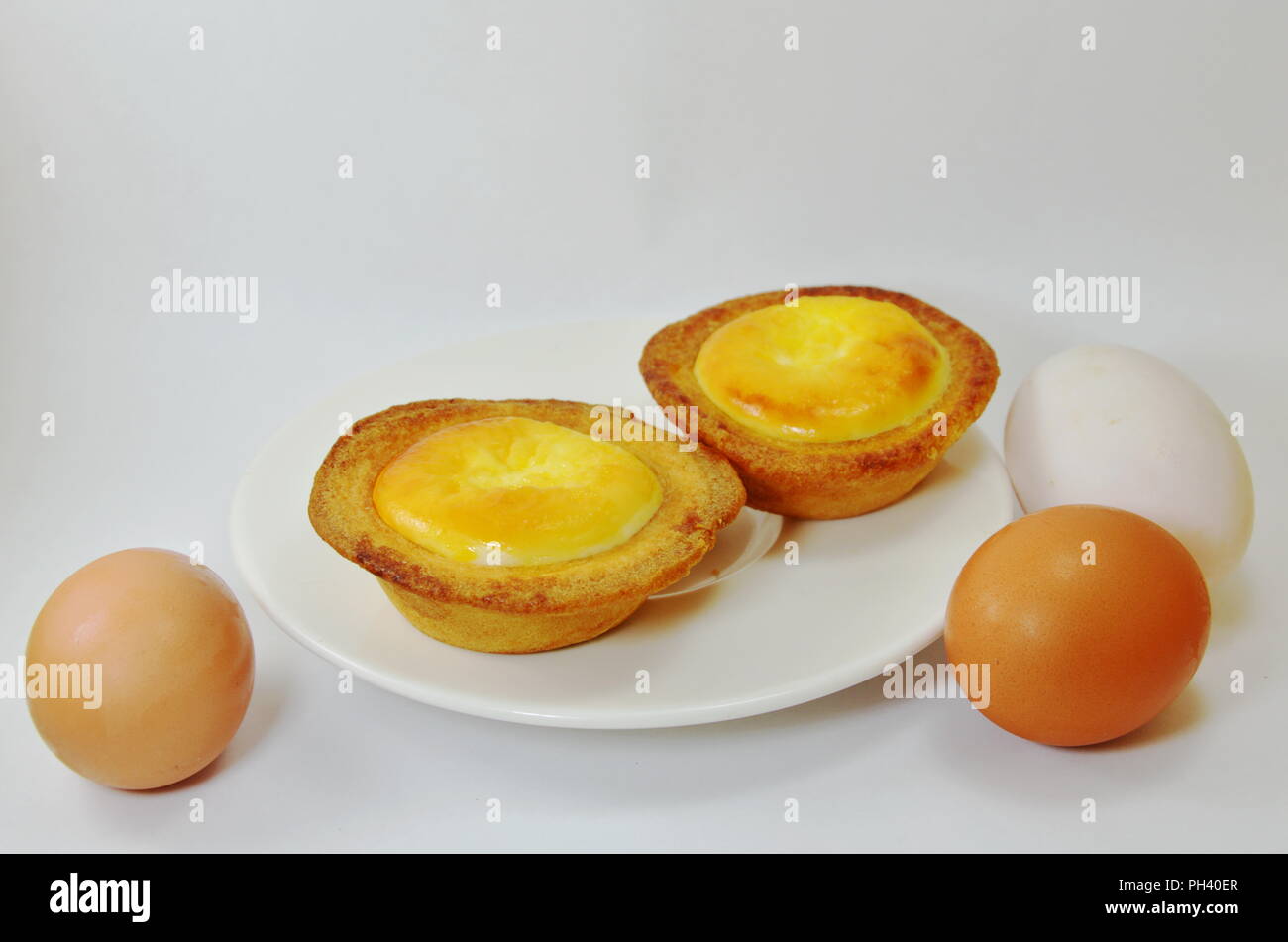 egg custard tart on dish Stock Photo Alamy