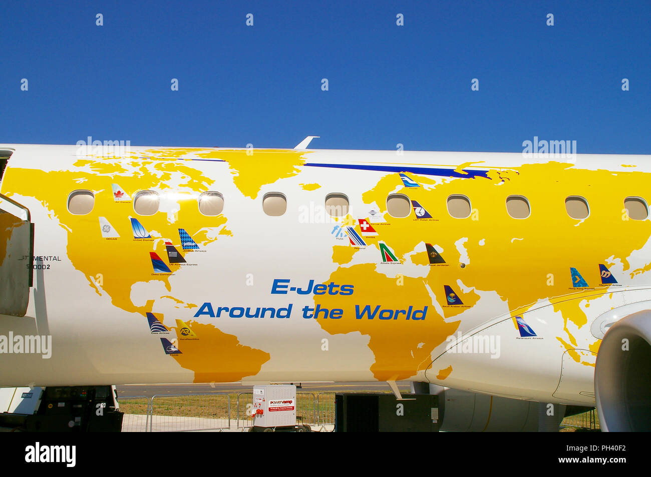 Embraer E-Jets Around the World plane graphic. Family of narrow body medium range twin engine jet airliners developed by the Brazilian firm. World map Stock Photo