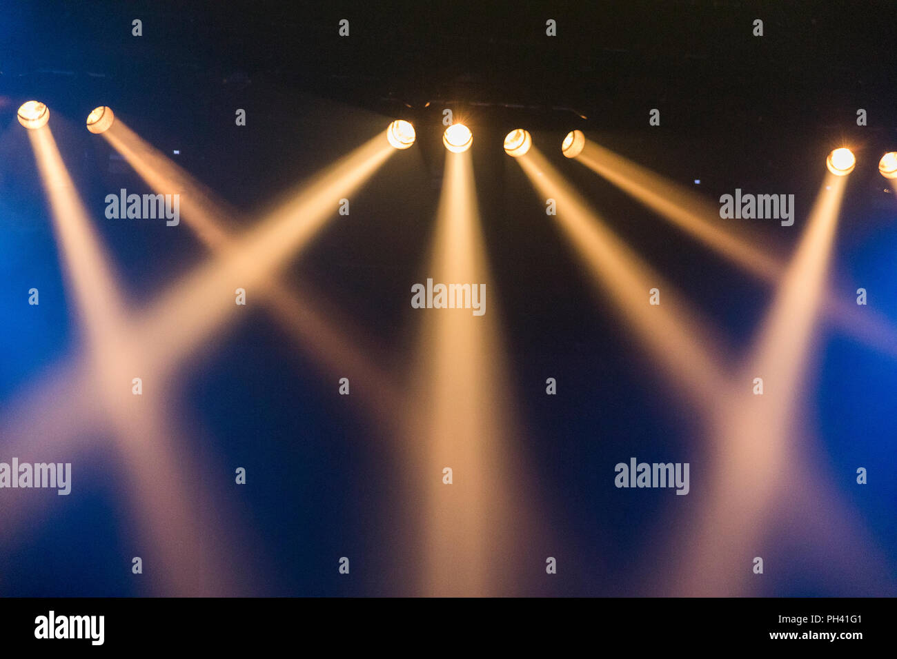 theatre spot lights lighting on stage Stock Photo - Alamy