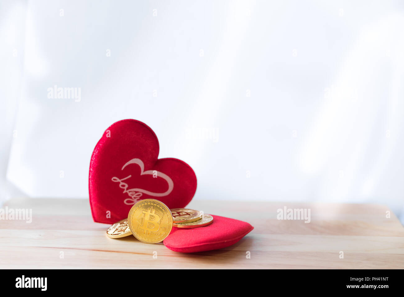 Conceptual cryptocurrency bitcoin with red heart denoting love or like  Stock Photo - Alamy