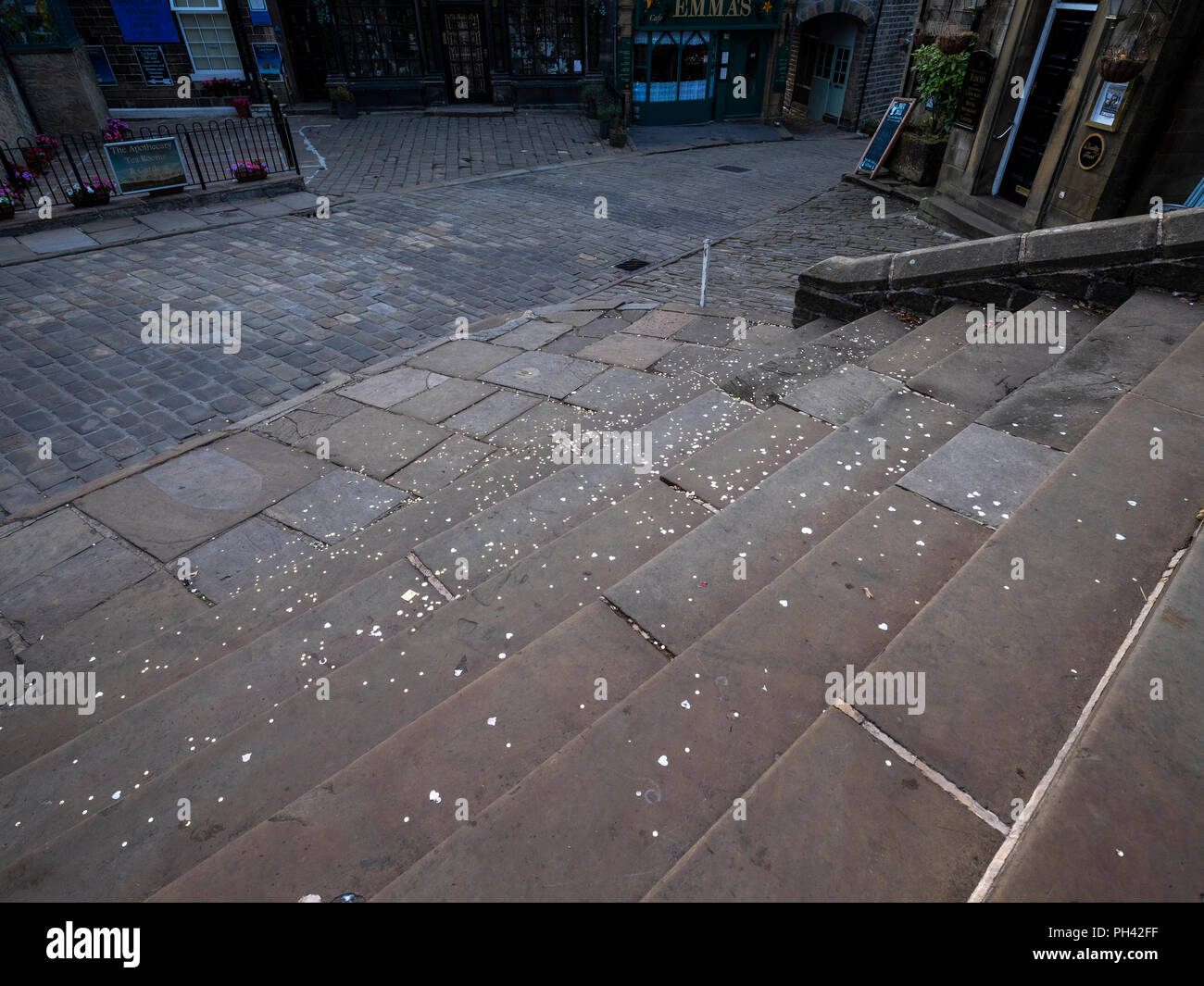 Confetti on the church steps in Haworth, West Yorkshire after a wedding Stock Photo