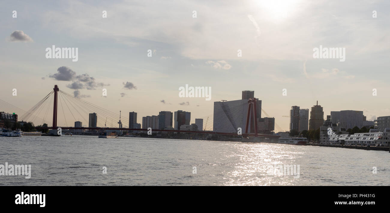 Picture of the willemsbrug in rotterdam on a very sunny day, some clouds Stock Photo