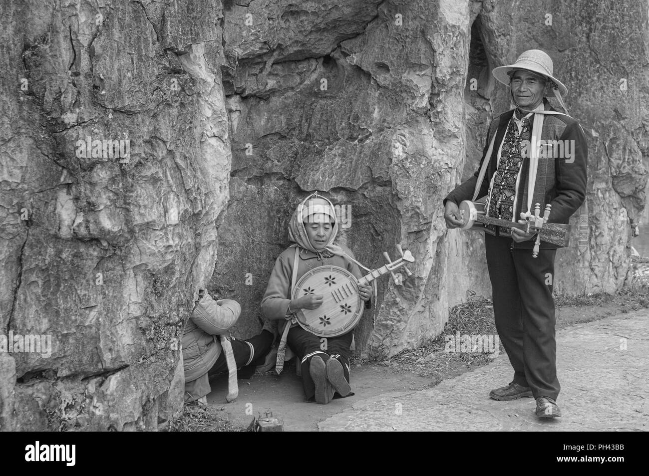 Shilin, Yunnan, China - 31 December 2017: A traditional chinese music band in the Stone Forest Stock Photo