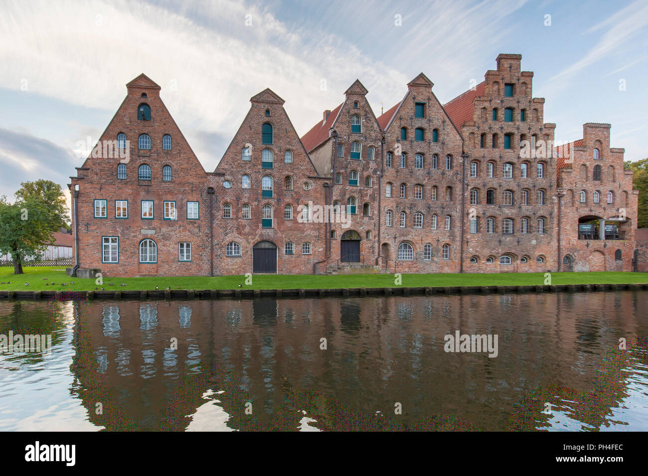Historic salt storehouses (Salzspeicher) on the river Trave in Luebeck, Schleswig-Holstein, Germany. Stock Photo
