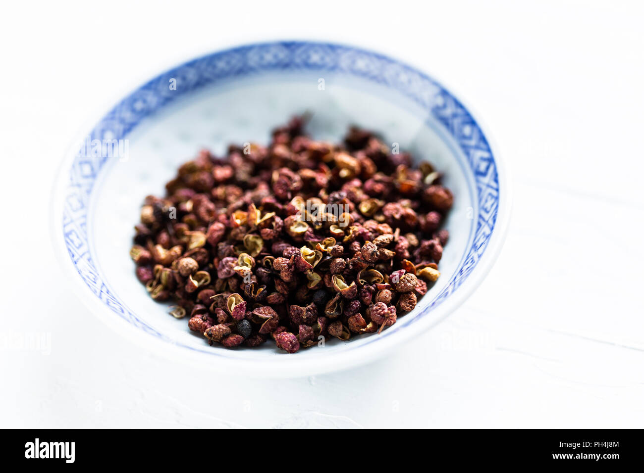 Sichuan peppercorns in as bowl Stock Photo Alamy