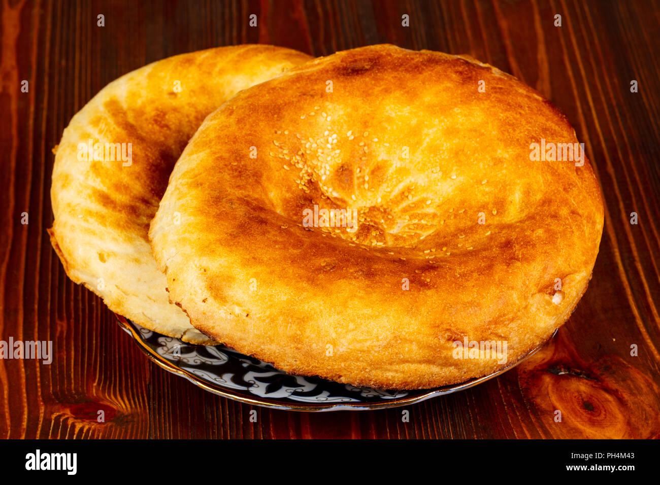 Uzbek traditional lepeshka in the plate Stock Photo