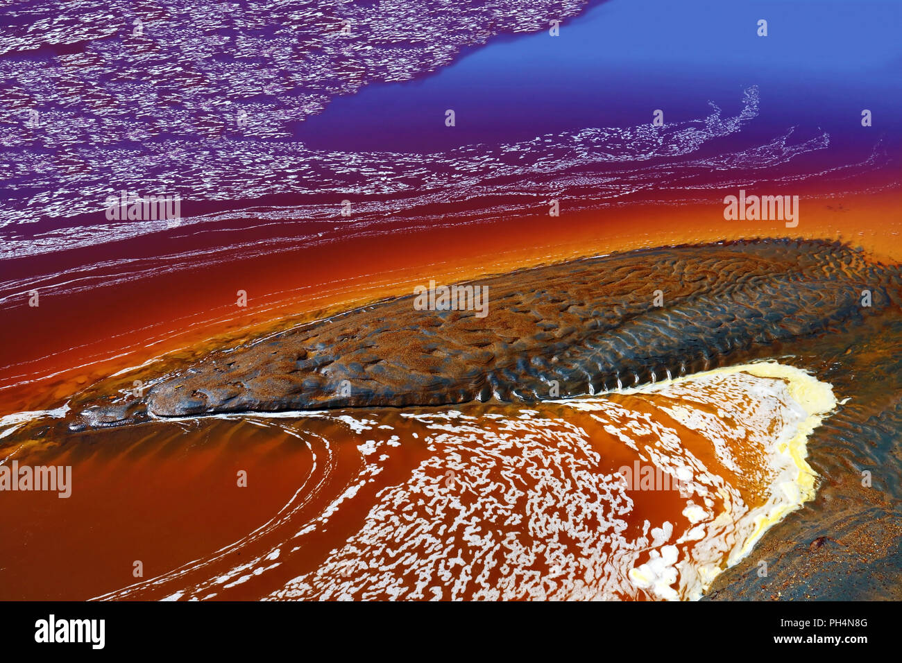 Amazing colors and textures of the water and mud of the Odiel river, in the province of Huelva, Spain Stock Photo