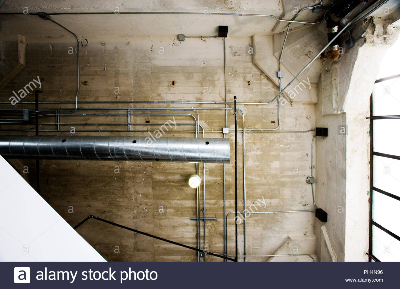 Exposed Pipes On Concrete Ceiling Stock Photo 217078098 Alamy