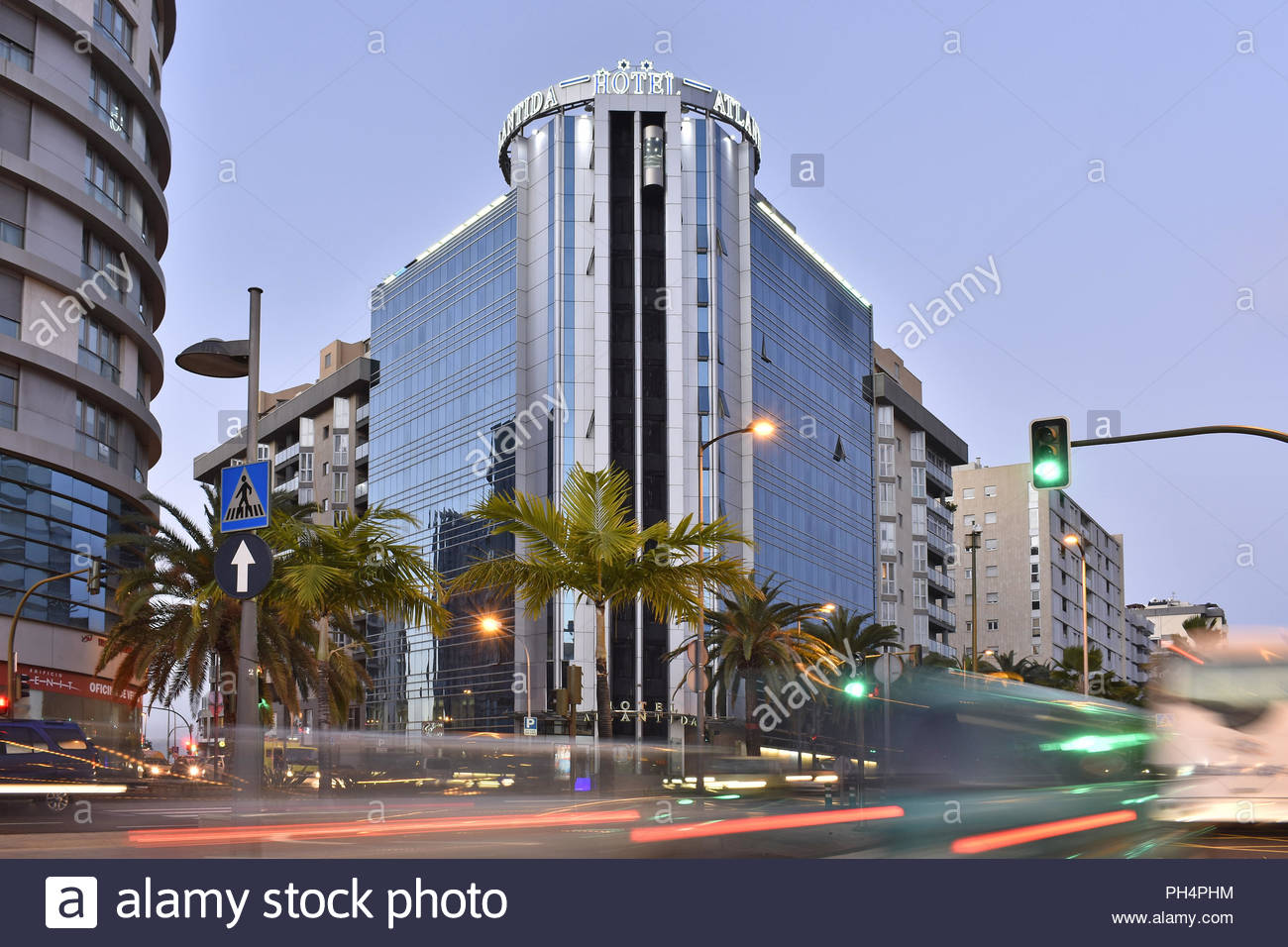 Hotel Silken Atlantida Modern Glazed Building Exterior Illuminated At Dawn In Santa Cruz De Tenerife Canary Islands Spain Stock Photo Alamy