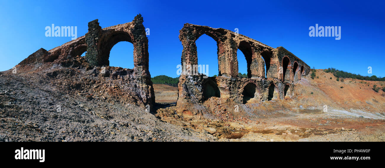 Ruins of a very old aqueduct in the so-called route of the mills, a great place for hiking in the province of Huelva, Spain Stock Photo