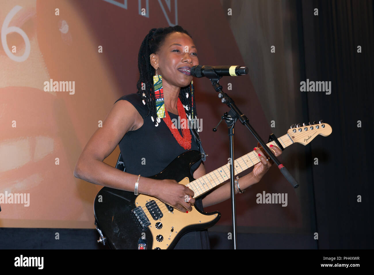 actress and musician Fatoumata Diawara performs before the screening of her Film 'Mali Blues' at the Filmfest München 2016 Stock Photo