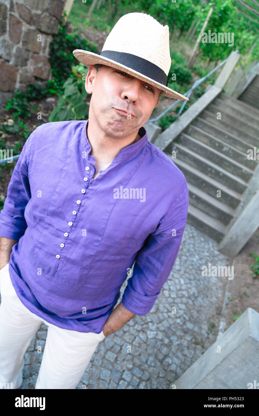 Funny man humorously grimaces and purse his lips Stock Photo Alamy