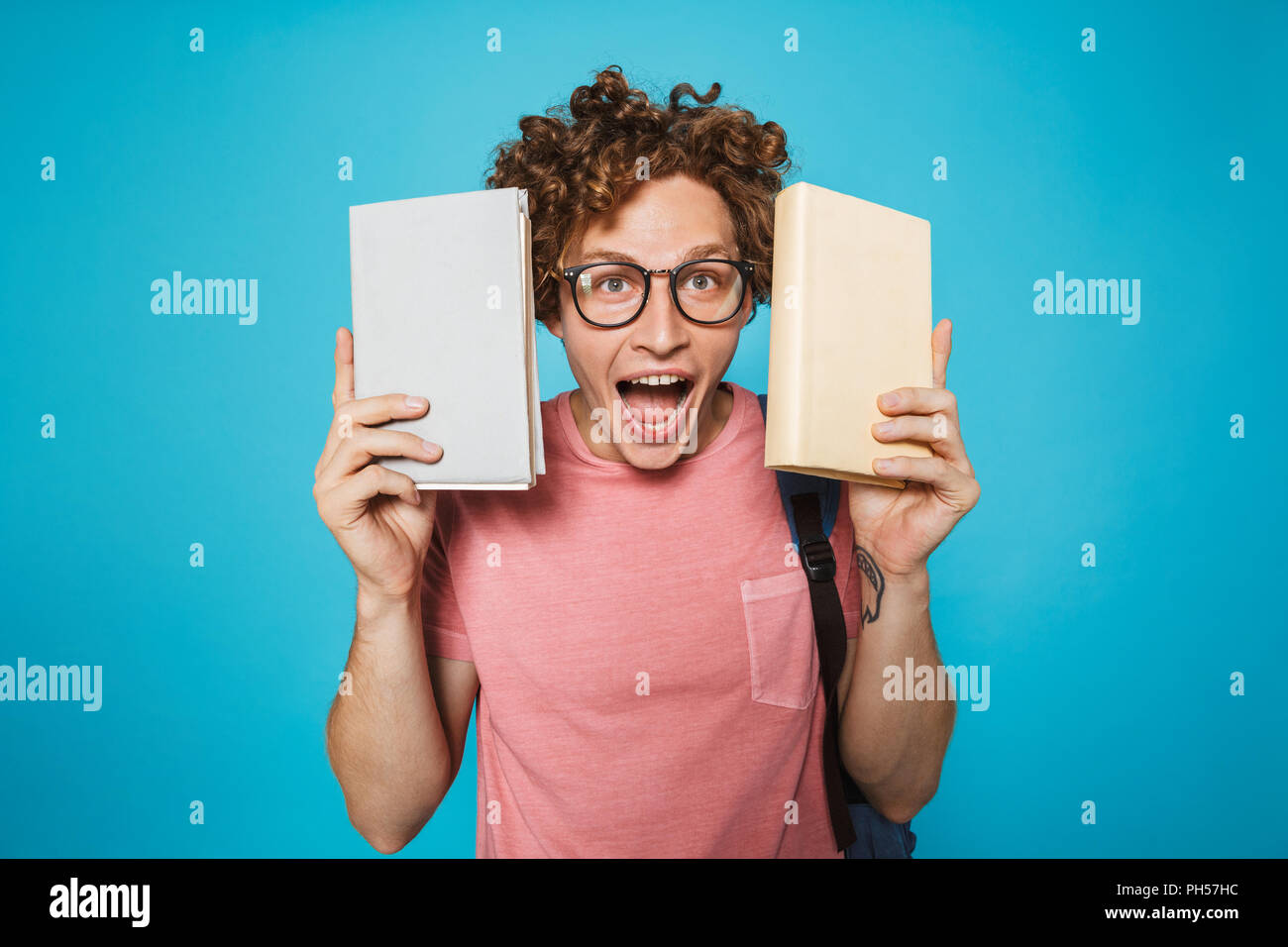 Image of genius student guy with curly hair wearing glasses and ...