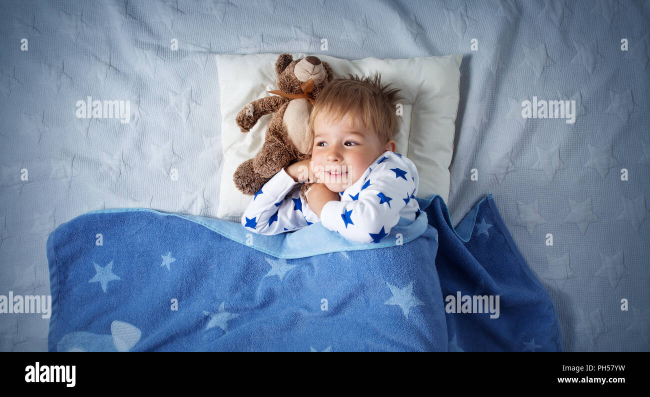 three years old child sleeping in bed Stock Photo Alamy