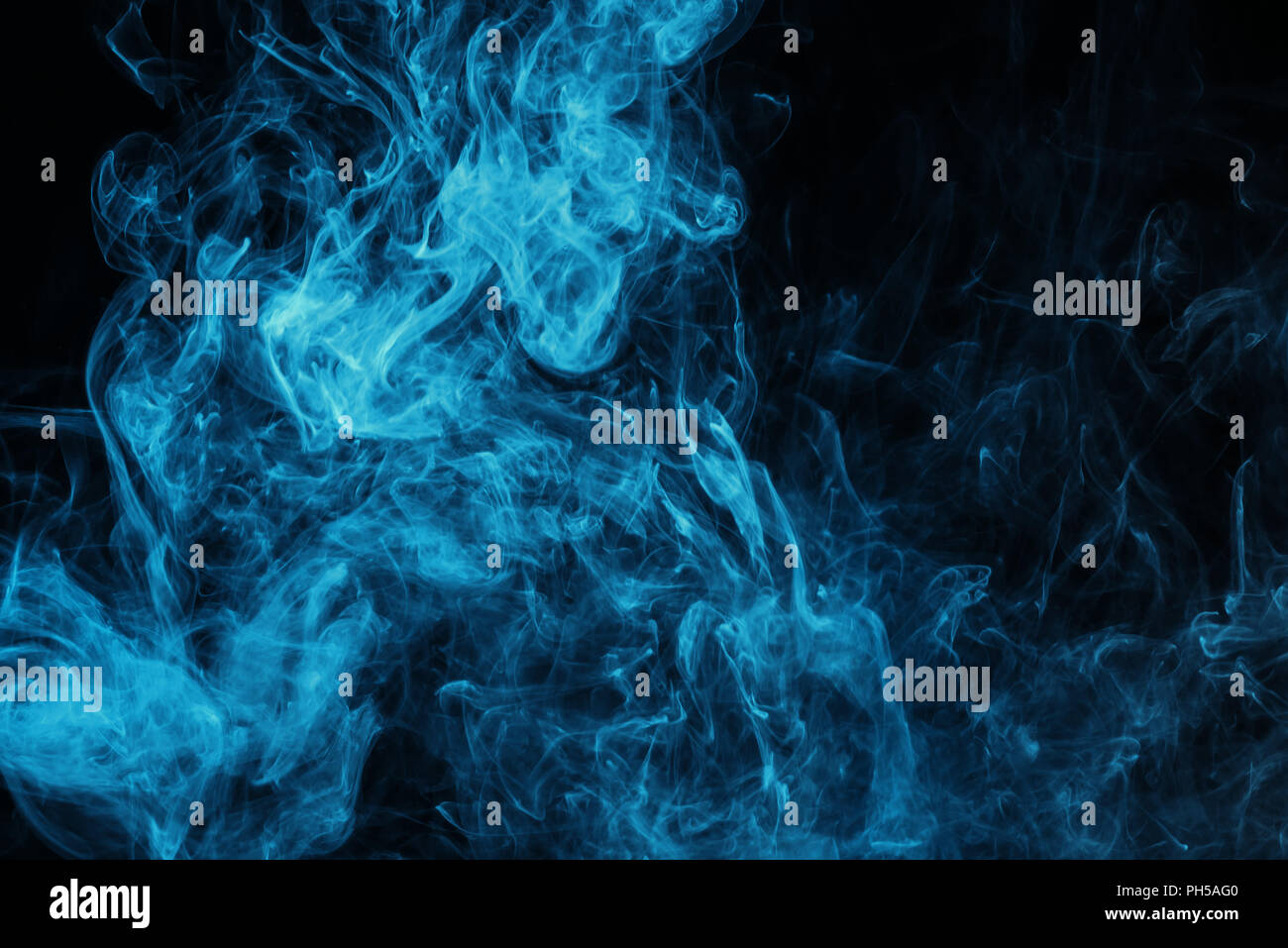 blue mystical smoke on black background Stock Photo - Alamy
