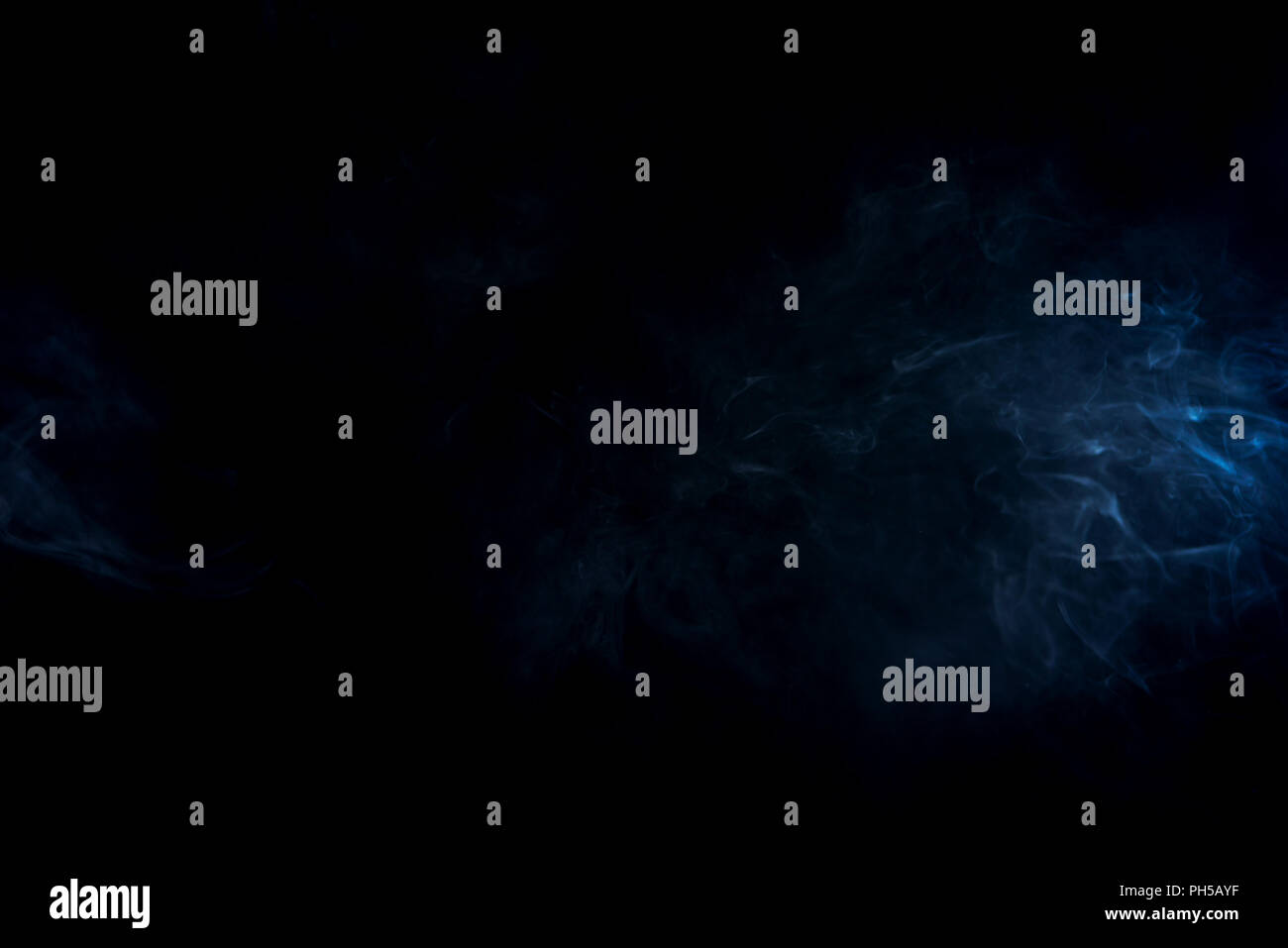blue abstract smoke on black background with copy space Stock Photo - Alamy