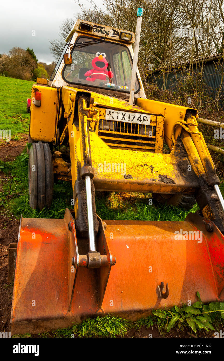 Elmo the muppet driving a JCB digger in Brecon Beacons National Park, Powys, Wales Stock Photo