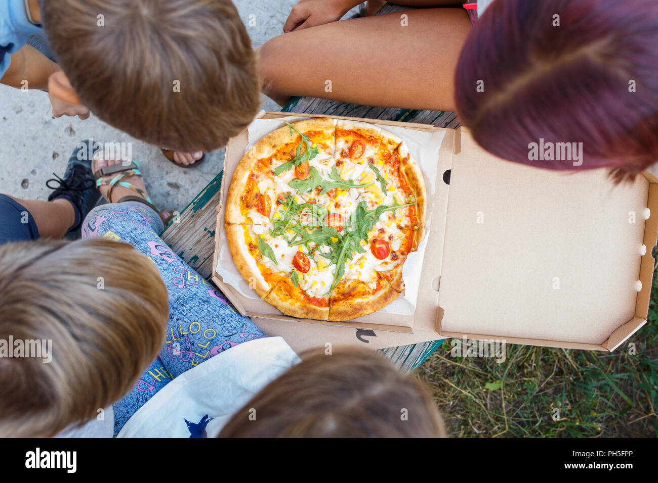 Friends Eating Pizza Together Sharing Platters Stock Photo 1038714430