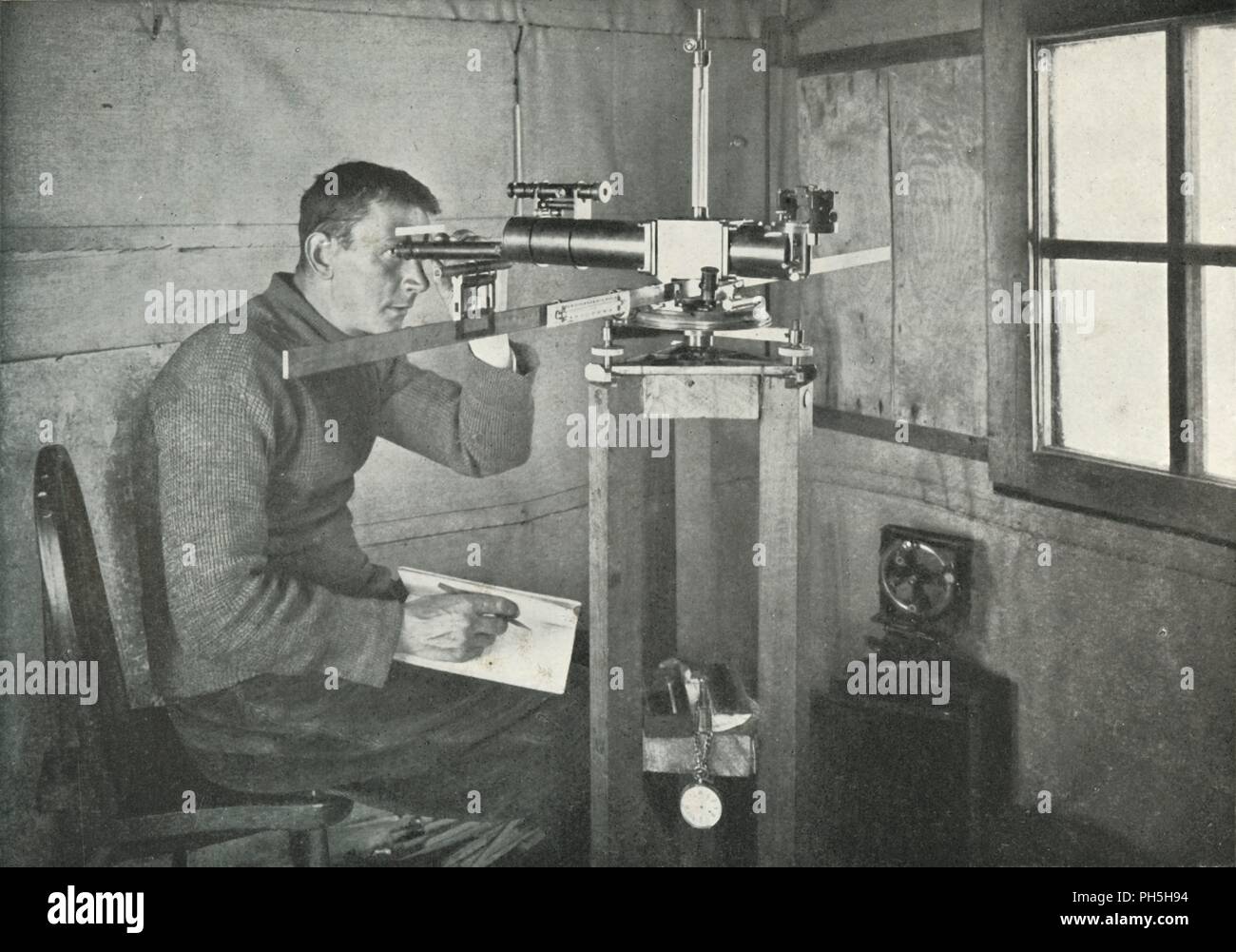 'Dr. Simpson at the Unifilar Magnetometer', 1911, (1913). Artist: Herbert Ponting. Stock Photo
