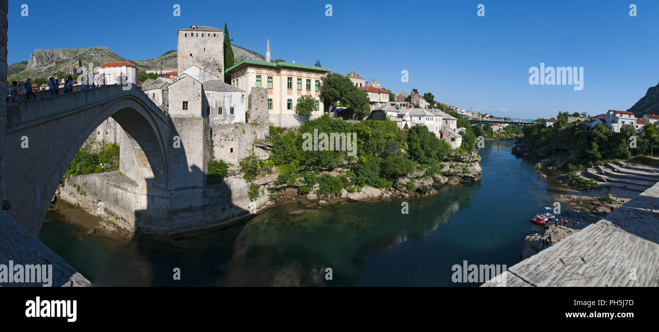 Mostar, Bosnia: view of the skyline and the Stari Most (Old Bridge), the 16th century Ottoman bridge destroyed in 1993 during the Croat-Bosniak War Stock Photo