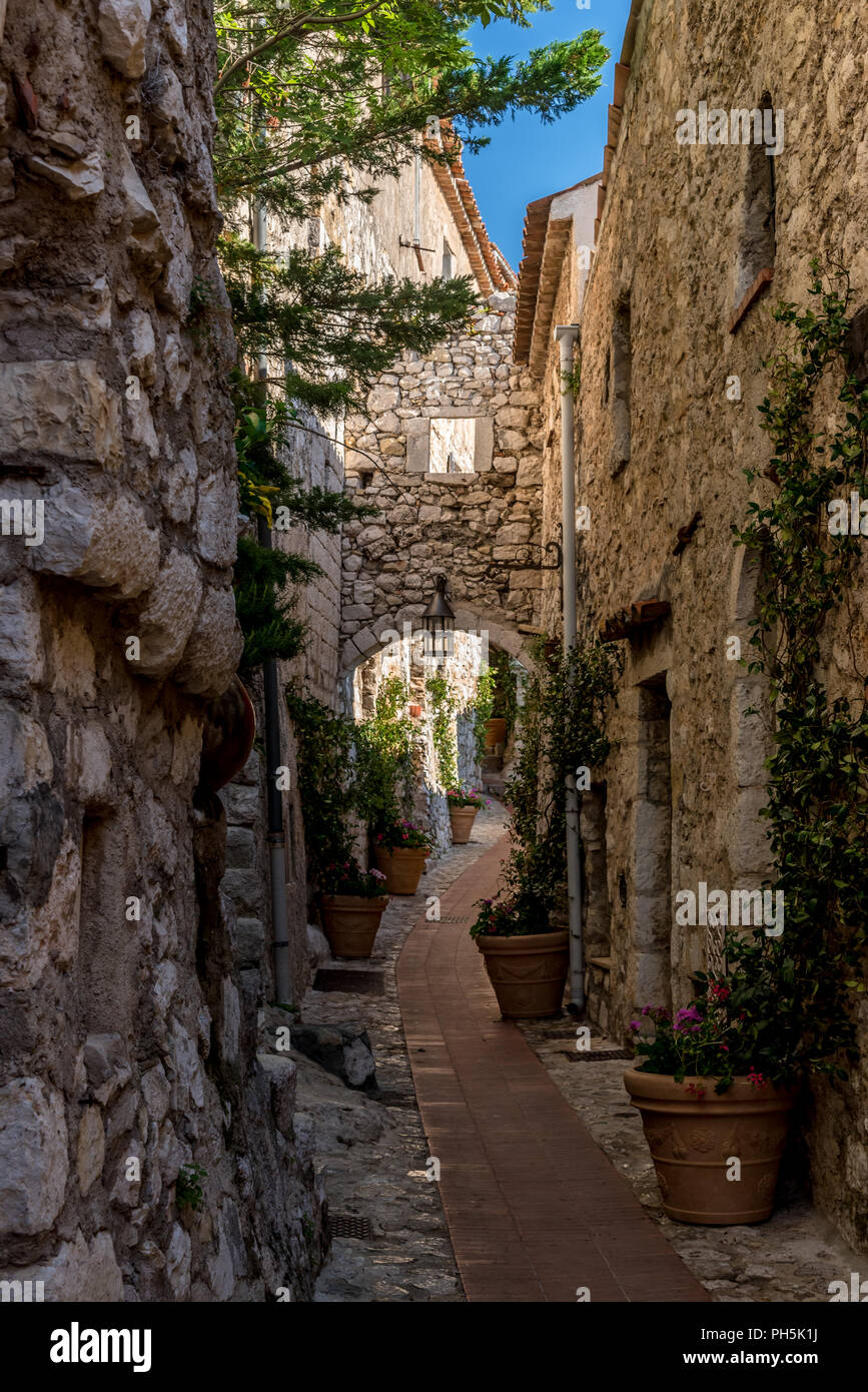 Narrow cobbled streets and old stone buildings in the village of Eze on the Cote d'Azur in the South of France Stock Photo