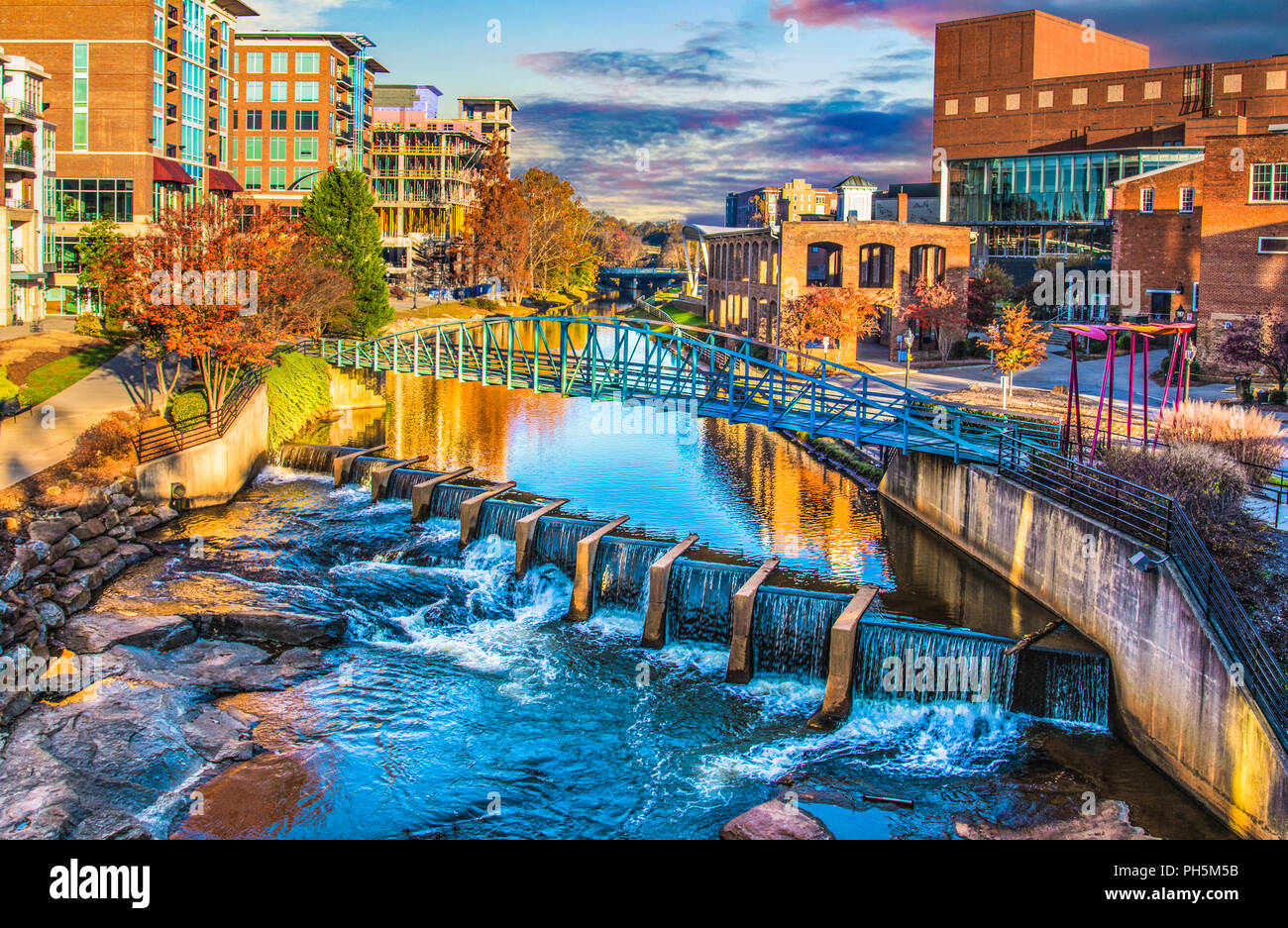 Reedy River and Skyline in Downtown Greenville South Carolina SC. Stock Photo