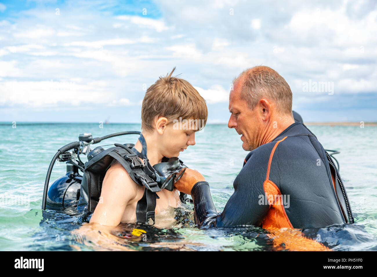 Boy dive suit hi-res stock photography and images - Alamy