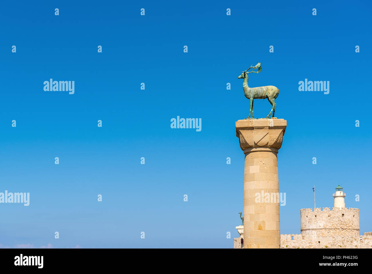 Bronze deer statue in Mandraki harbor of Rhodes town. Rhodes island