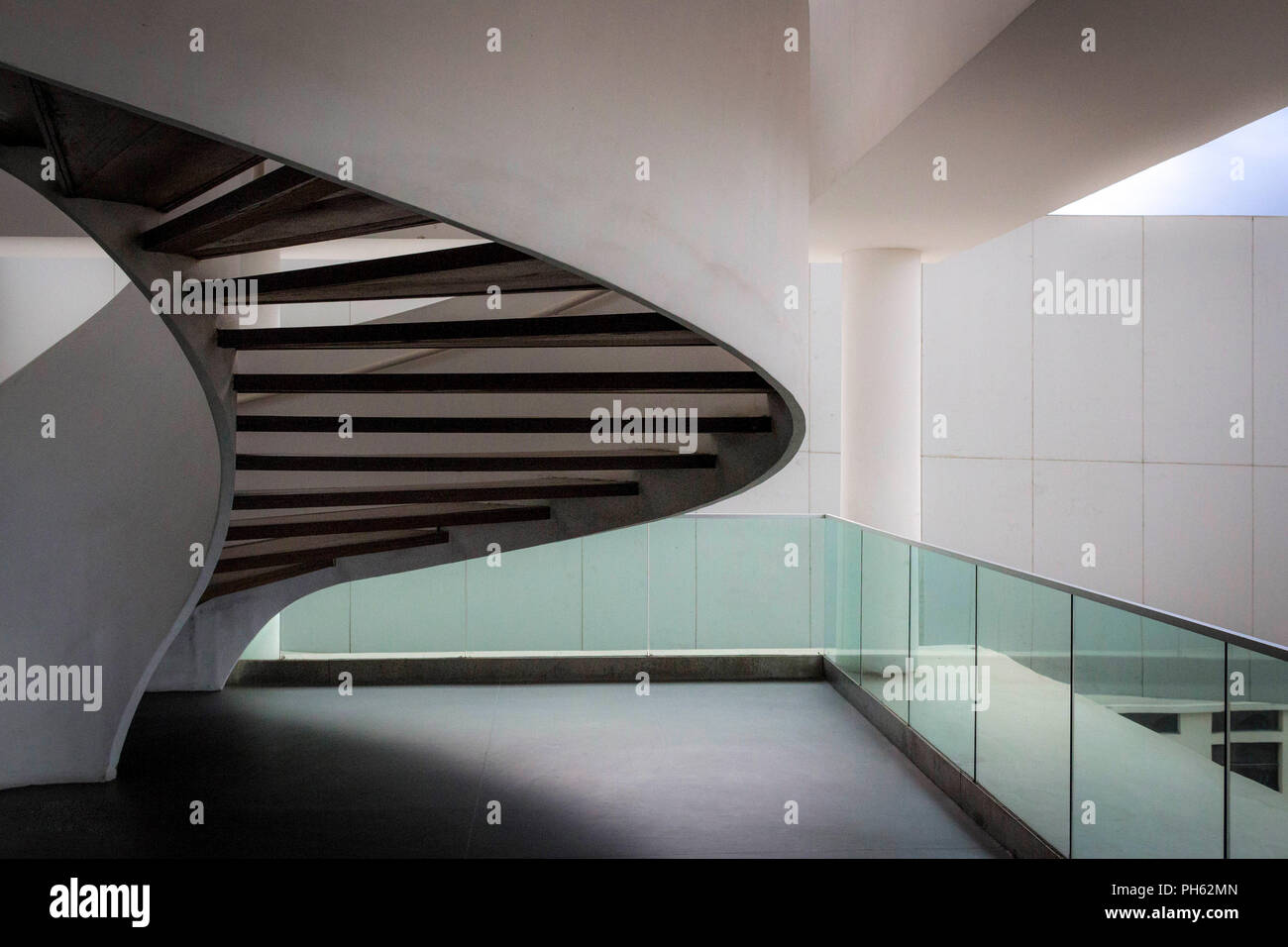 swinging stairway leads to the next level, beautiful architecture piece. Stock Photo