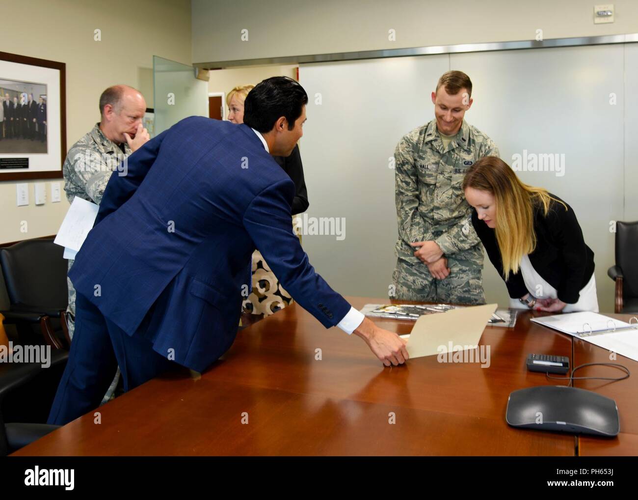 Lockheed Martin And U S Air Force Personnel Look At Certificates