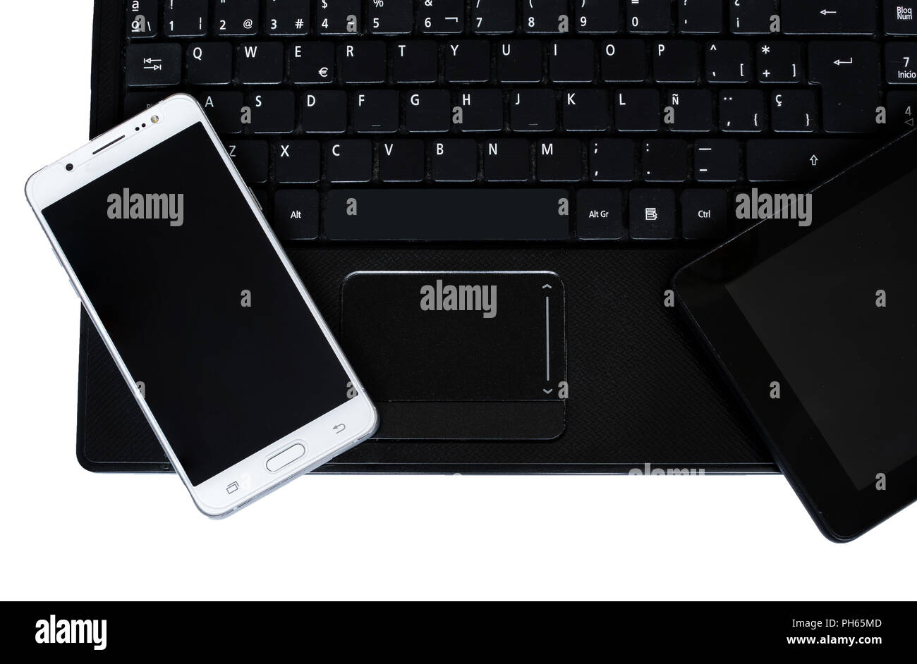 Laptop with smartphone and tablet on a white background. Common objects in an office Stock Photo