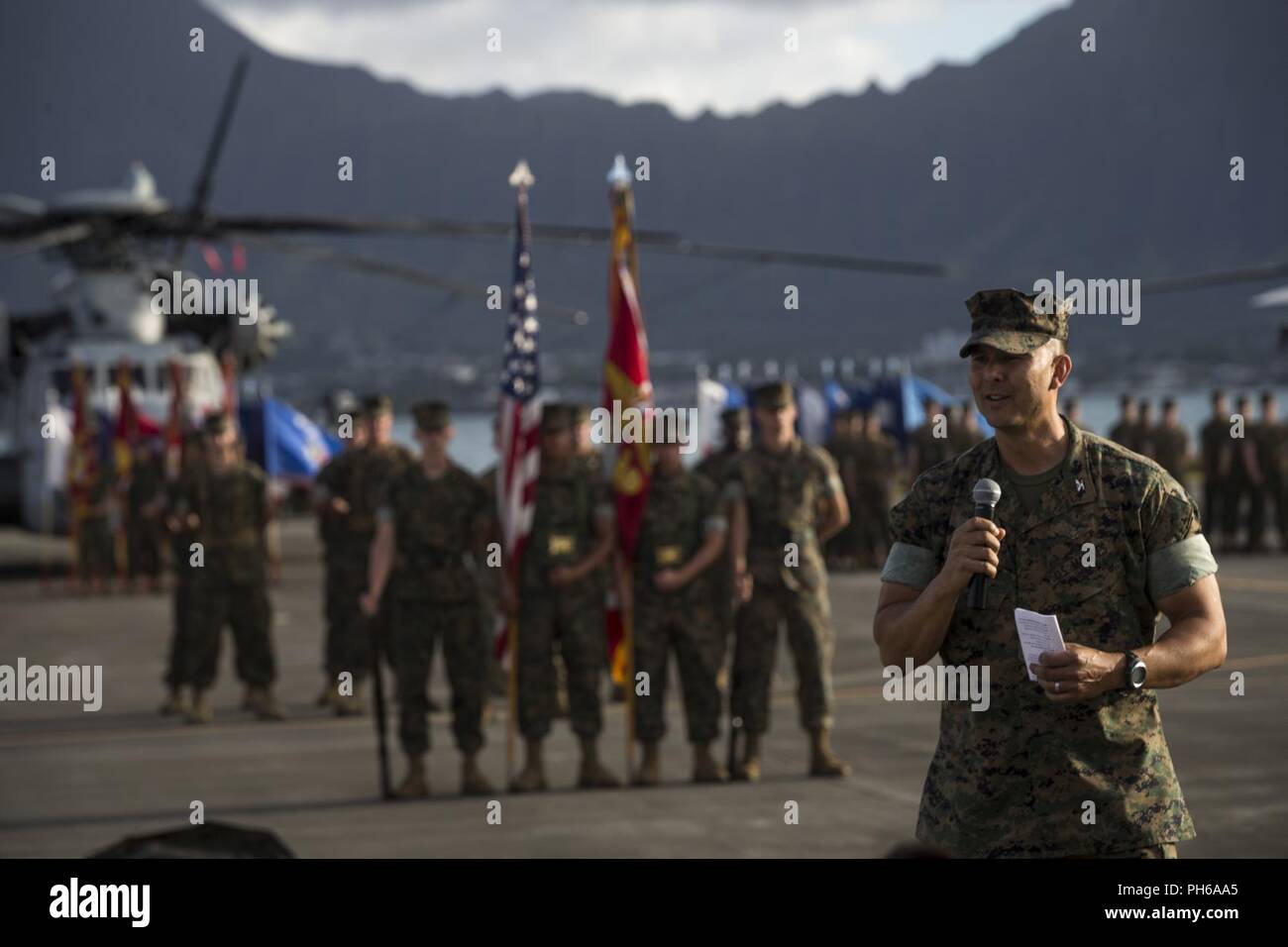 U.S. Marine Corps Col. Stephen Lightfoot, on-coming commanding officer, Marine Aircraft Group (MAG) 24, 1st Marine Aircraft Wing, speaks during the MAG 24 Change of Command Ceremony, Marine Corps Base Hawaii, June 29, 2018. Col. Christopher Patton relinquished command to Col. Lightfoot. Stock Photo