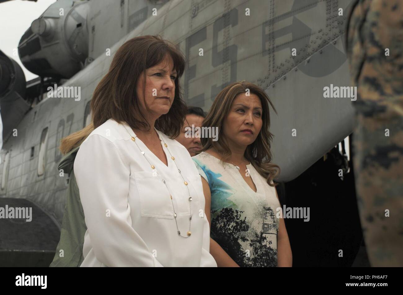 U.S. second lady Karen Pence, left, and Guatemalan first lady Patricia Morales attend a pre-flight brief before boarding a CH-53E Super Stallion helicopter belonging to Special Purpose Marine Air-Ground Task Force - Southern Command at La Aurora International Airport in Guatemala City, Guatemala, June 28, 2018. Pence flew with Morales to visit La Escuintla, an area damaged by volcanic eruptions by Fuego Volcano. Pence and her staff delivered care packages to families and assessed the total damage caused by the volcano that has affected the lives of millions in the area. The Marines and sailors Stock Photo