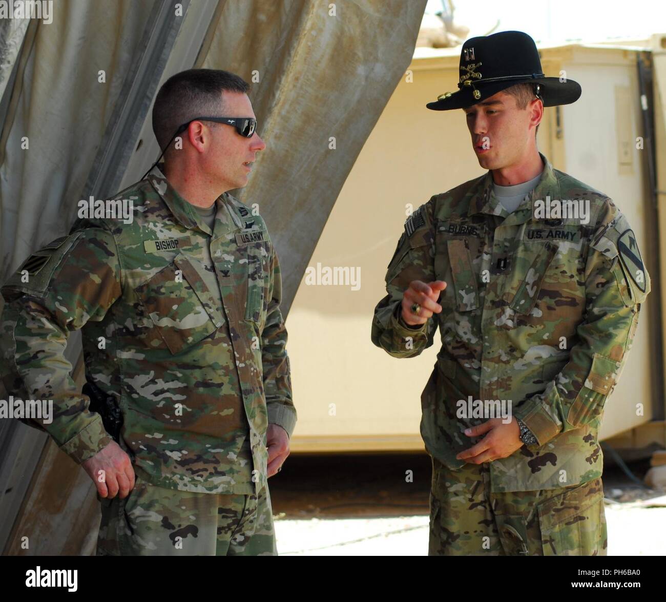 UNDISCLOSED LOCATION – Capt. James Burns (right), commander of Foxtrot ...