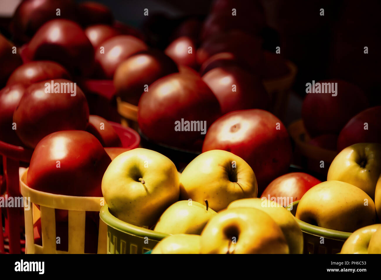 Red and Yellow apples in a basket Stock Photo