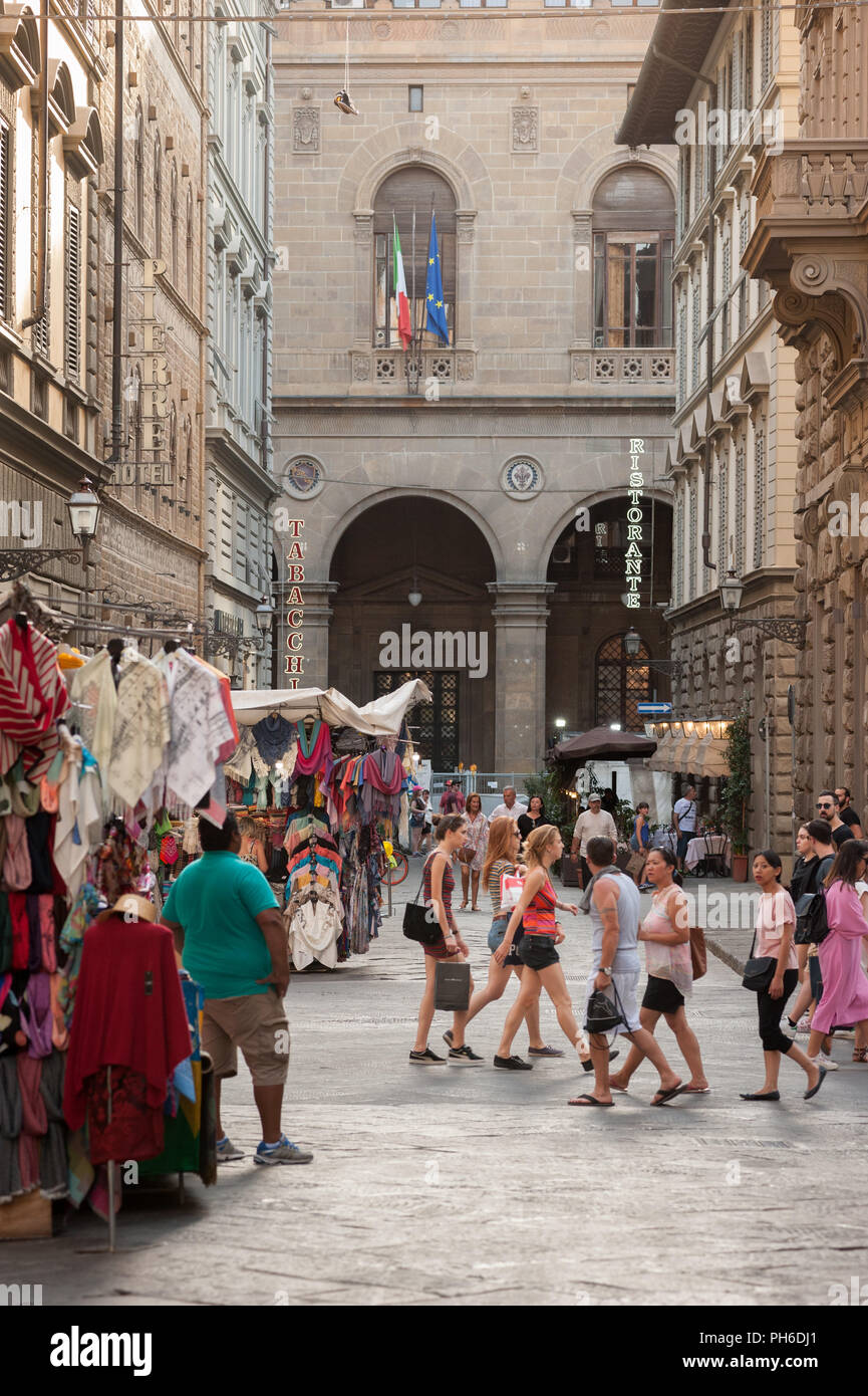 Florence, Italy - 2018, July 14: People walking in the streets of the historic centre of Florence, in a summer day. Stock Photo