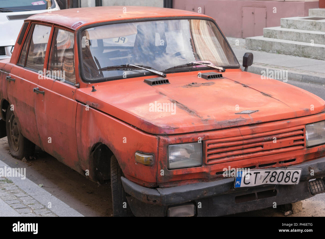 Abandoned car in Torun, Poland Stock Photo Alamy