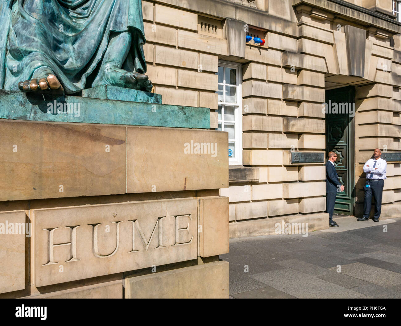 David Hume bronze statue by Alexander Stoddart, Edinburgh High Court of Justiciary, Royal Mile, Edinburgh, Scotland, UK, with rubbed toes Stock Photo