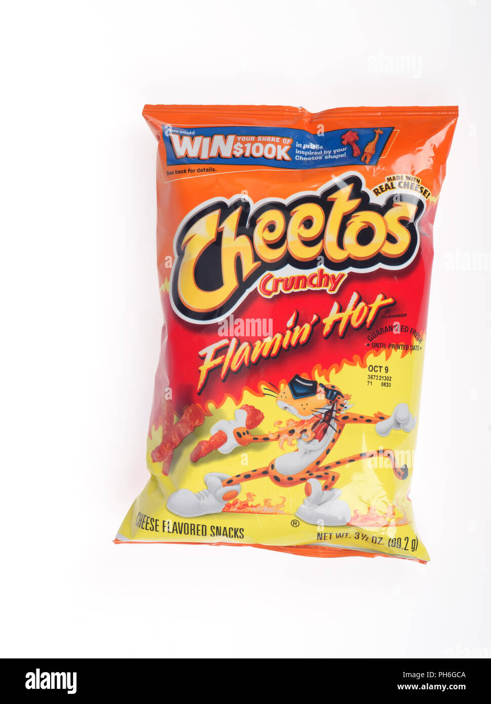 Bag of Cheetos Crunchy Flamin' Hot cheese flavored snacks by Frito Lay company, a subsidiary of PepsiCo on white background Stock Photo