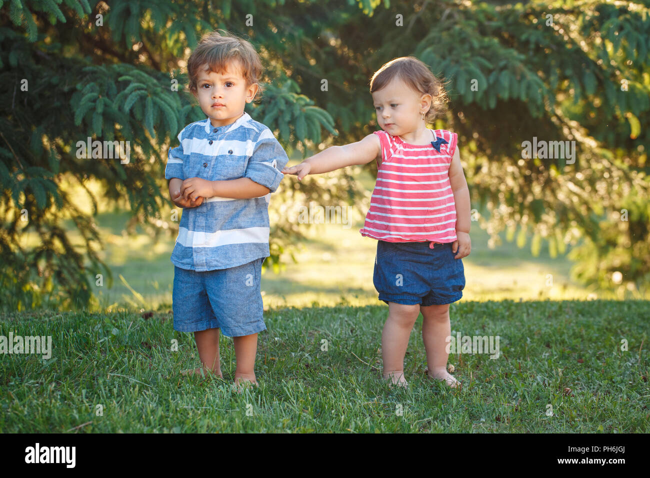 Group portrait of two white Caucasian cute adorable funny boy and