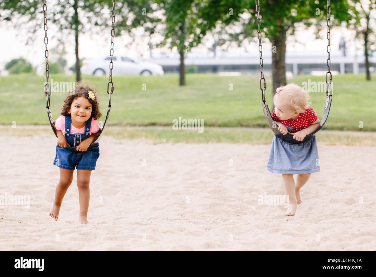 Portrait Of Two Happy Smiling Little Toddlers Girls Friends