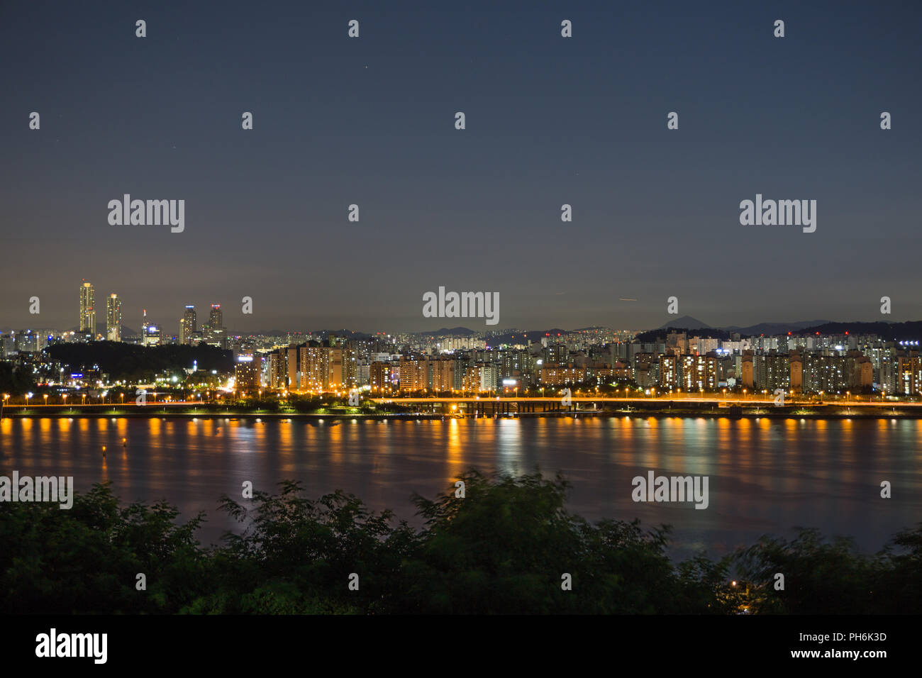 Night view of apartment and Traffic blur by Han River in Seoul, South Korea Stock Photo