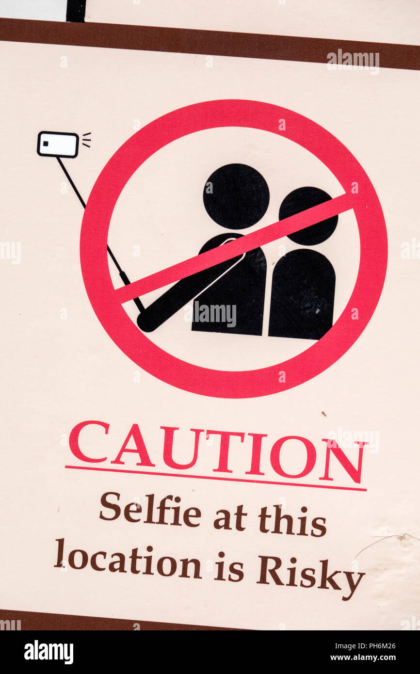 Sign in English and Hindi warning people against taking selfies for safety reasons Stock Photo