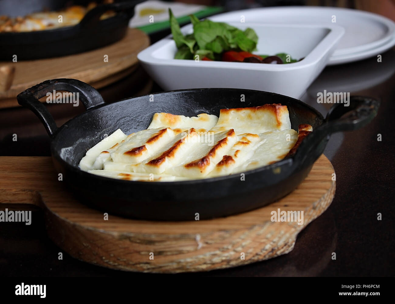 Fried Halloumi cheese still hot in the pan Stock Photo Alamy